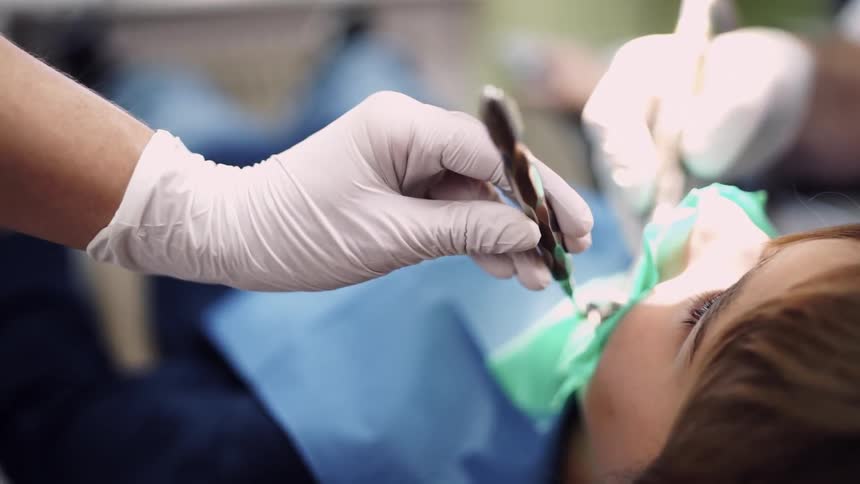 A boy at a dental operation
