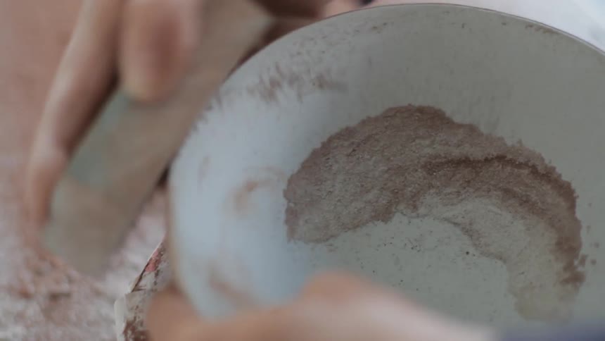 A person making pottery