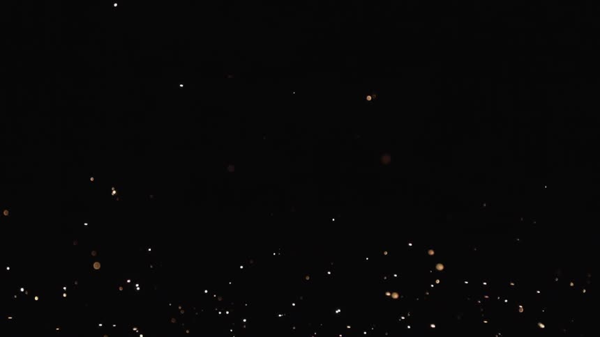 Sparks fly through the night sky