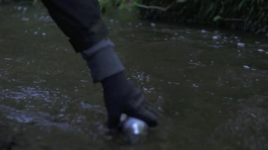 A person fetches water