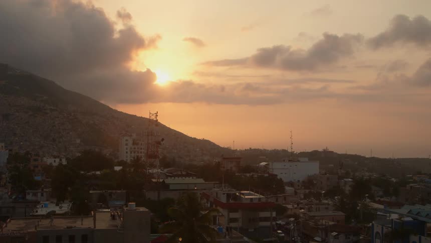 The town is right on the bottom of the hillside