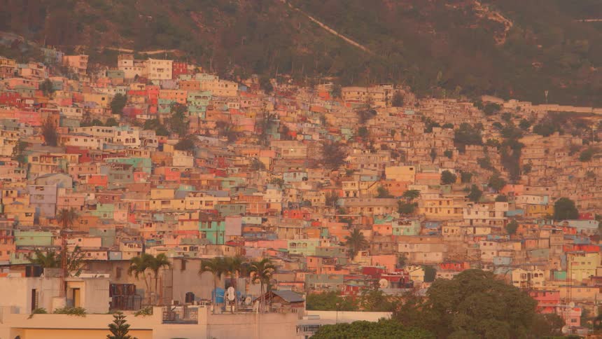 Buildings cover a hillside in a city