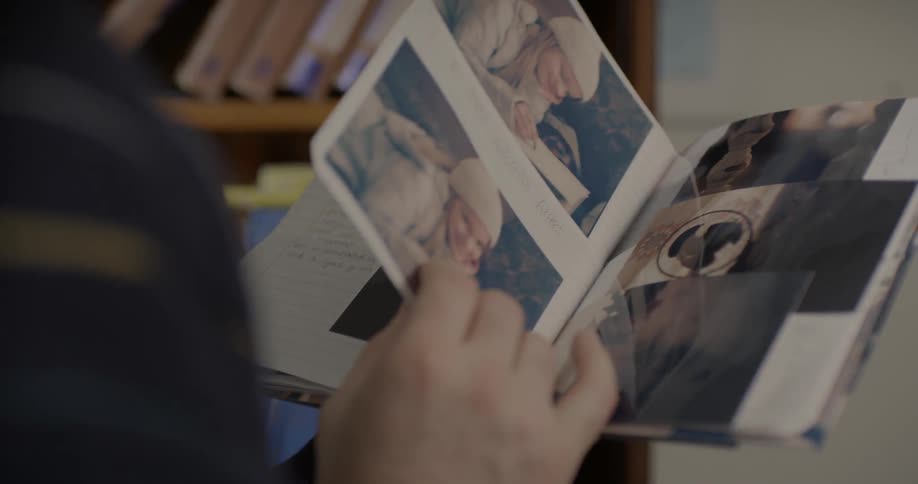 Someone is looking through a photo album