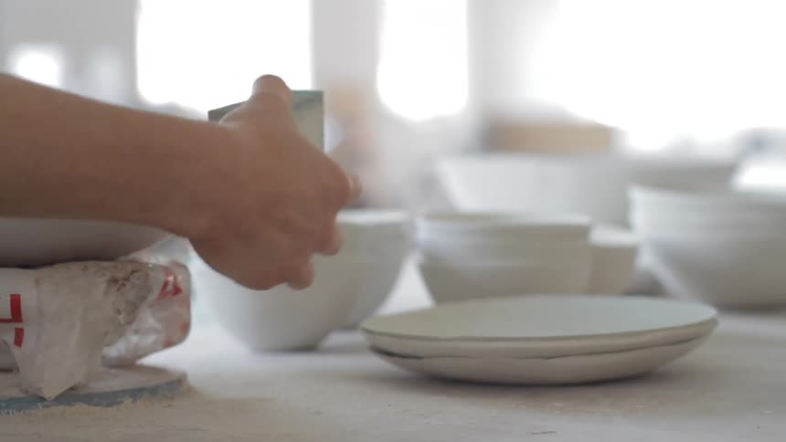 A person making pottery