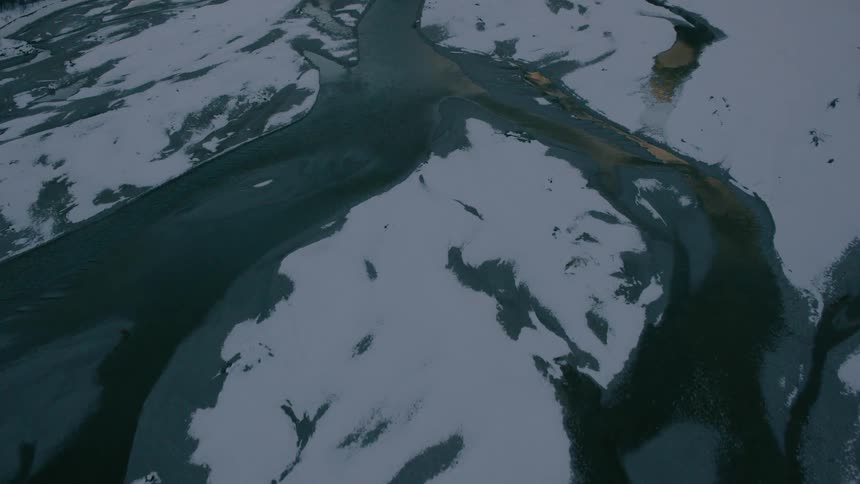 Ice formations are scattered in the water
