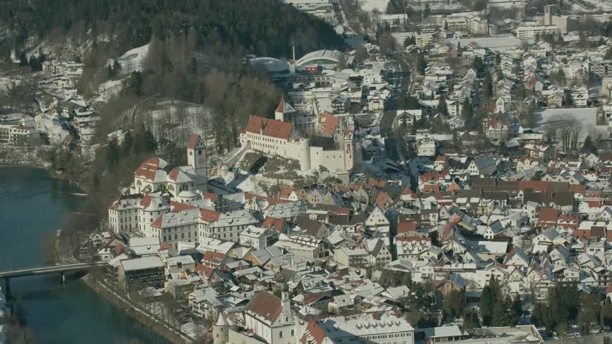 Snow covers the rooftops of a small town