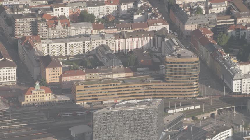 Aerial shot of Innsbruck with PEMA building- capital of Tyrol