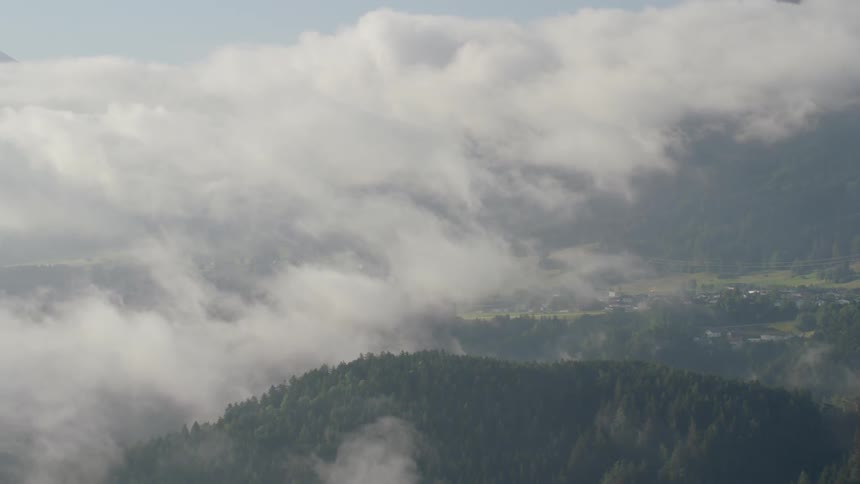 A fog covered valley as viewed from the air