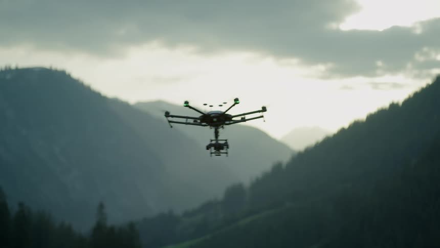 A drone wobbles in the air