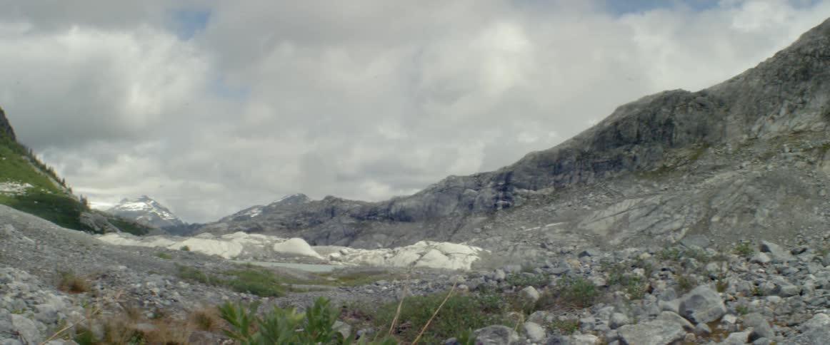 Clouds over a small mountain