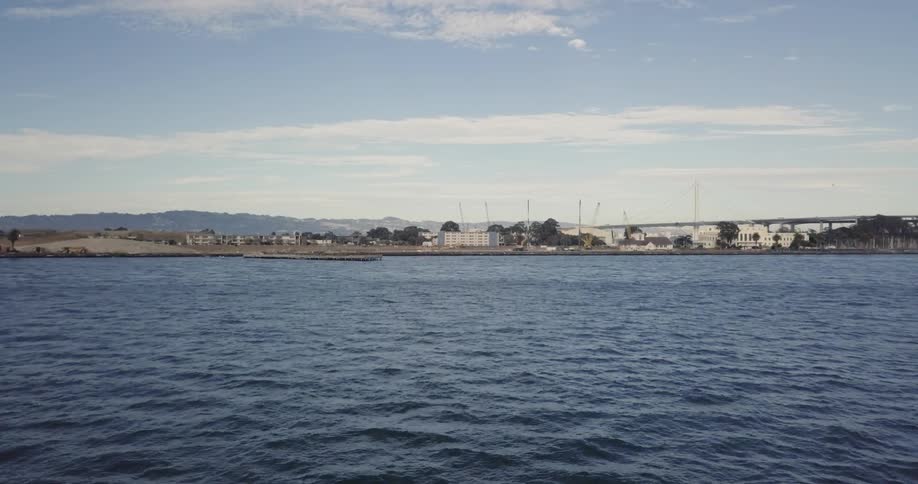 Water flows in water next to a city