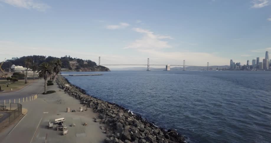 Water flows towards the rocky shore