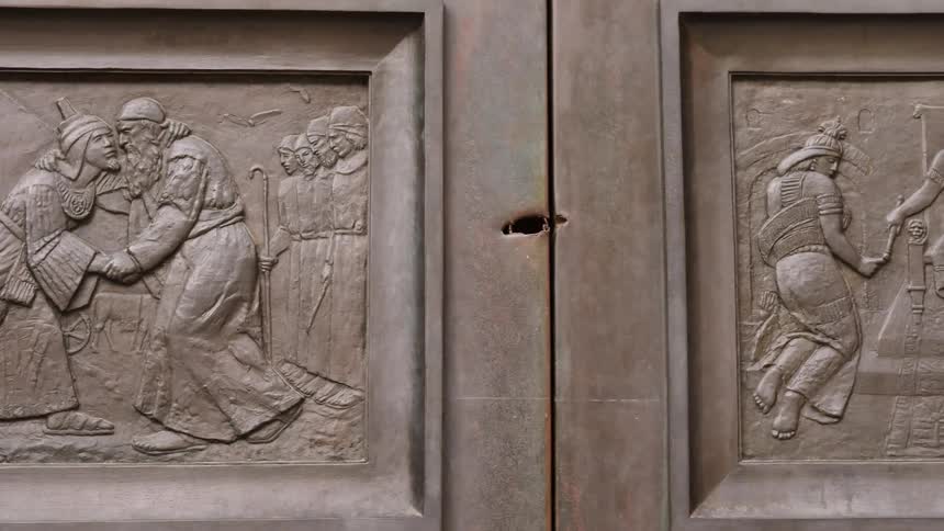 Carvings cover a wood door