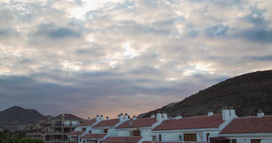 Clouds passing over a small town