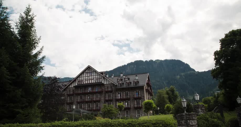 People leave a quaint hotel in the countryside
