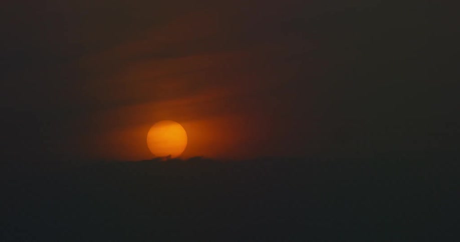 The sun has turned the sky crimson before nightfall