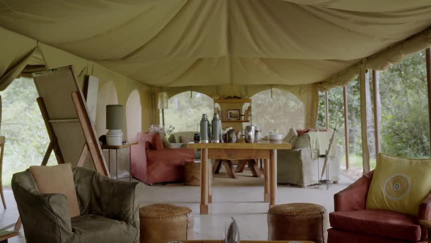 Furniture is arranged in a tent