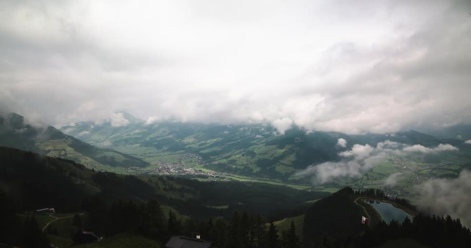 Timelapse of clouds moving across mountaintops
