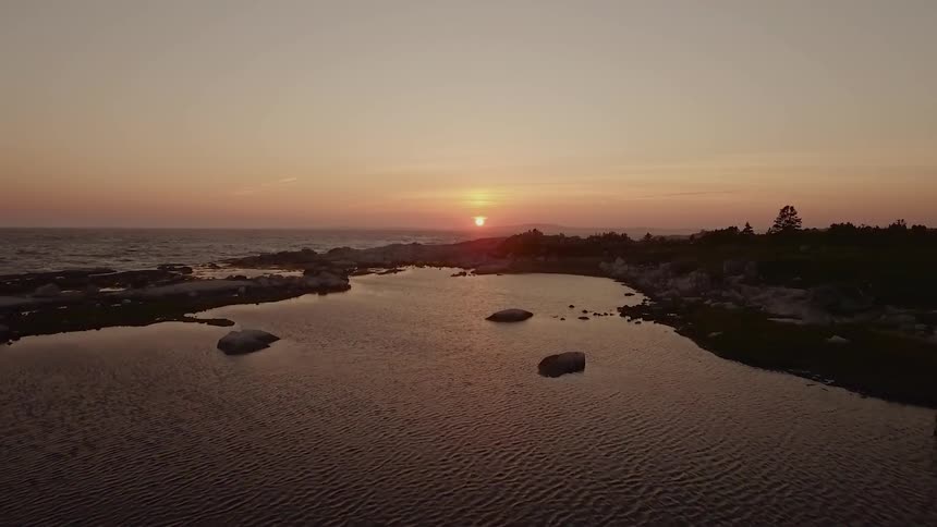 The sun set over the coast