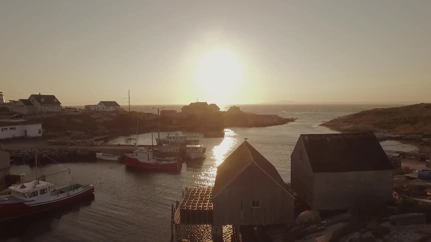 The sun shines on a fishing village