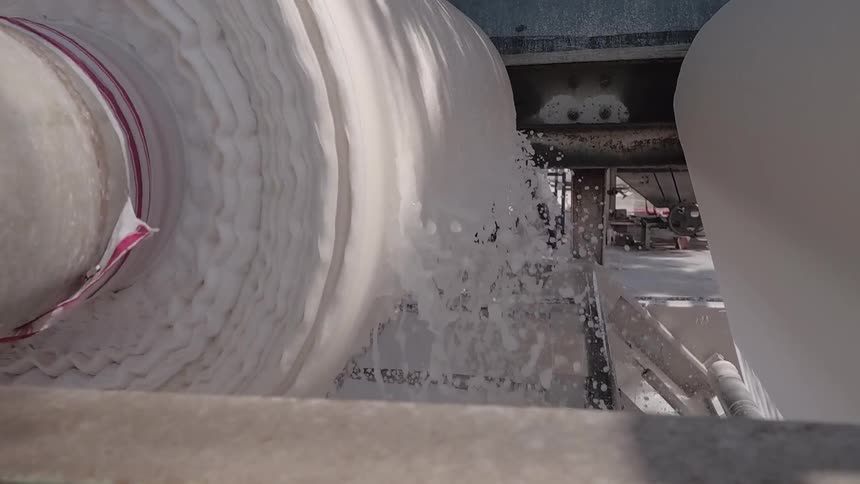 Water flows over equipment in a factory