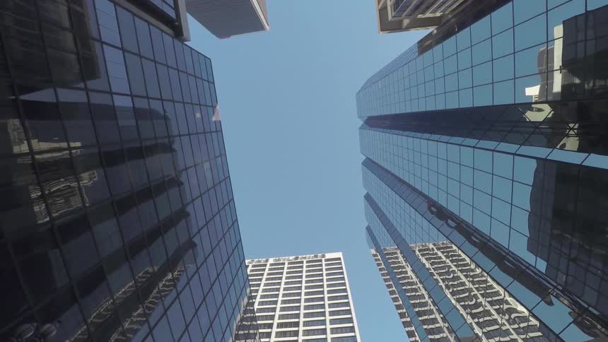 City buildings seen from below on a sunny day