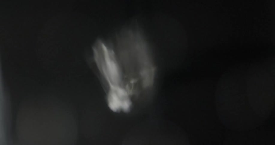 The light is flashing in the dark water