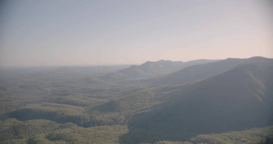 Fog is covering this green valley