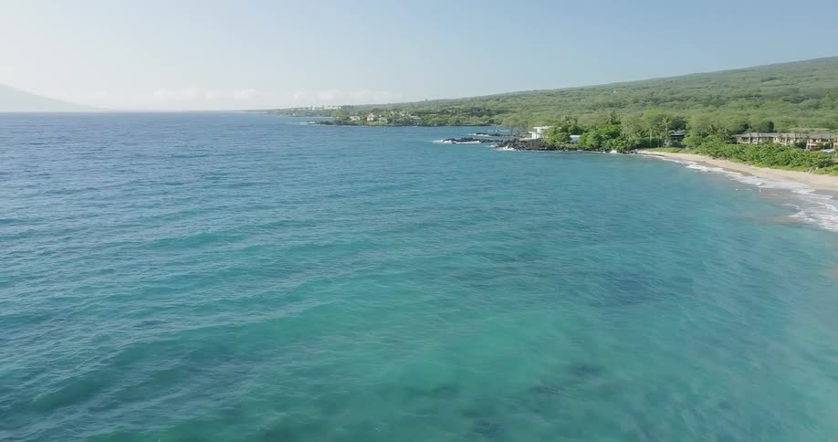 The water is clear and blue near this coast
