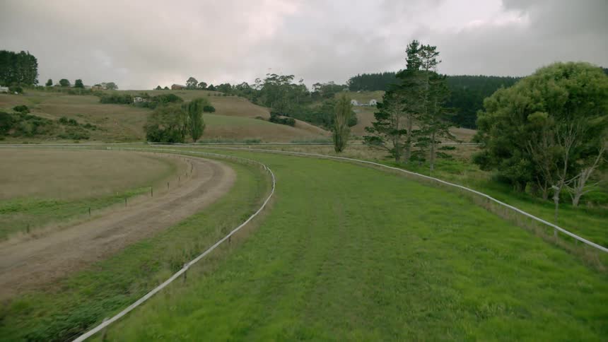 The long green race track runs in a circle