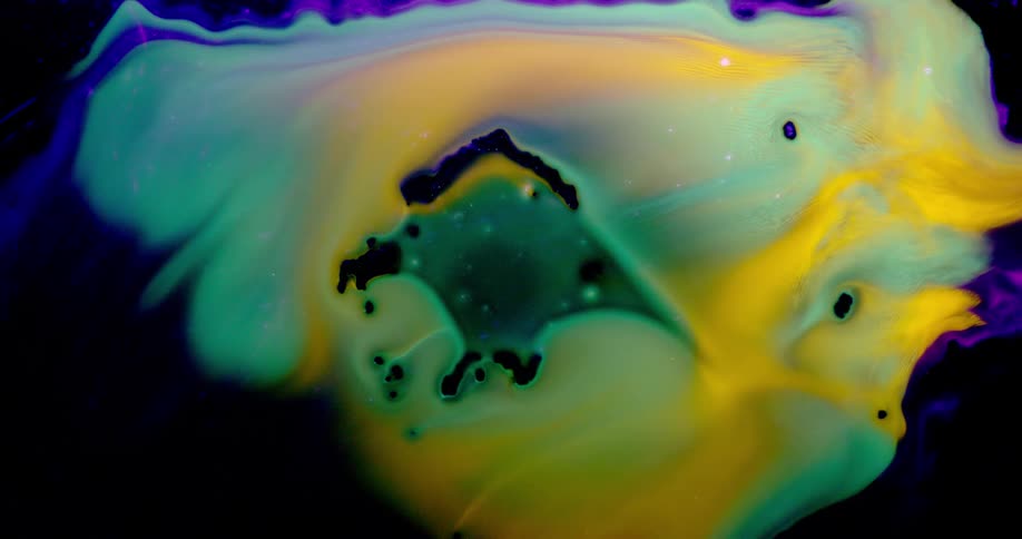 The water has colored ink swirling around in the middle