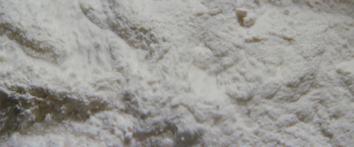 White powder churns and is blown around