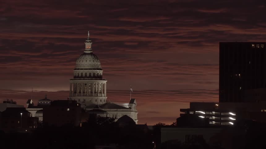The capital is shown at night