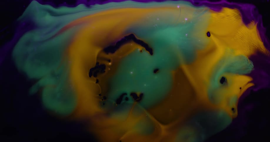 Blue and yellow smoke is swirling around