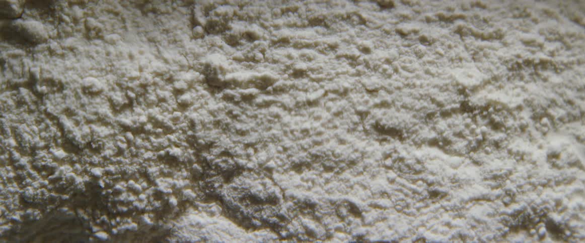 Grains of sand tumble