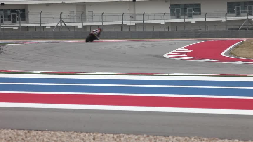 Bikers are biking around a track