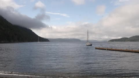 A boat sails on a lake