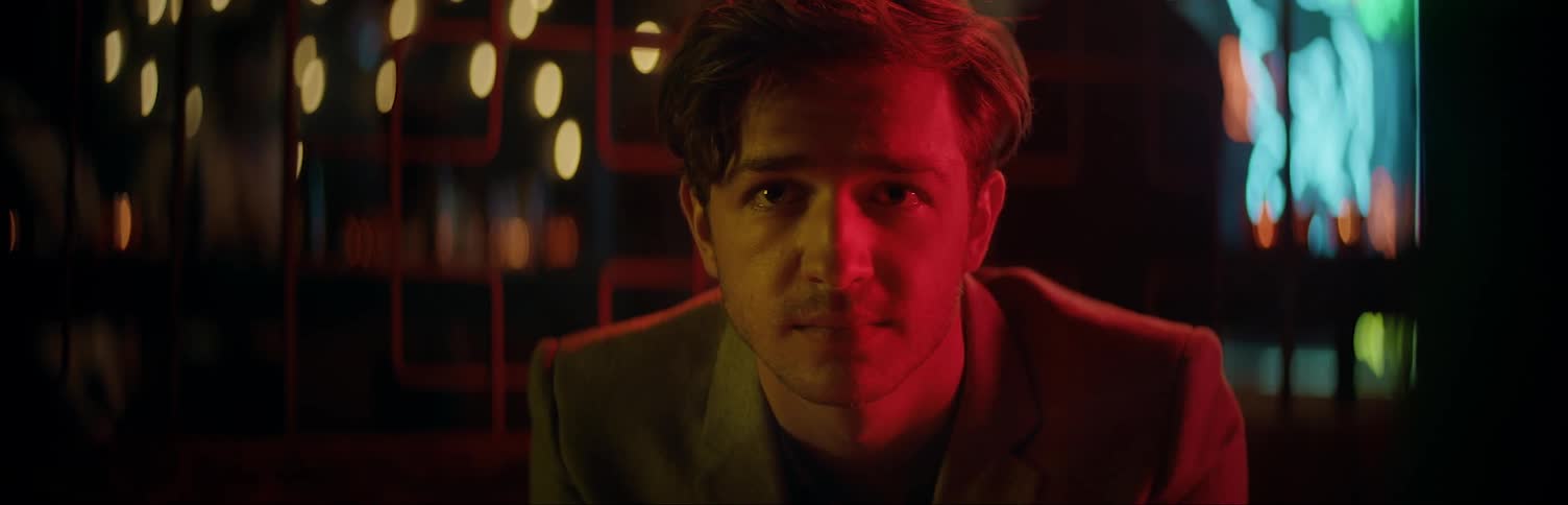 Man at club staring 