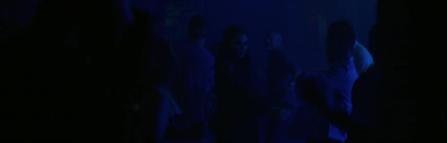Group of people dancing in club