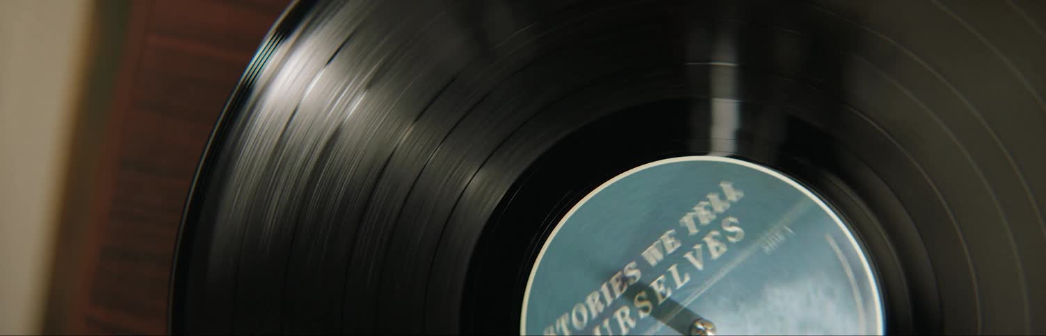 A record slowly spins on the turntable