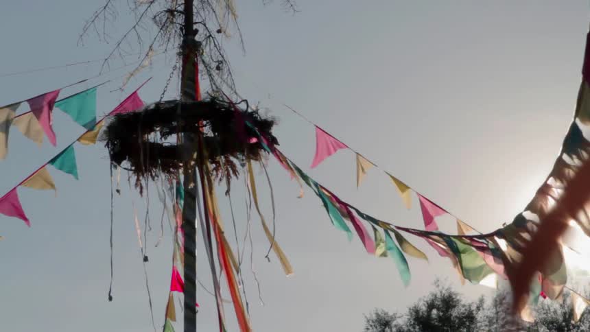 Multi colored banners wave in the breeze