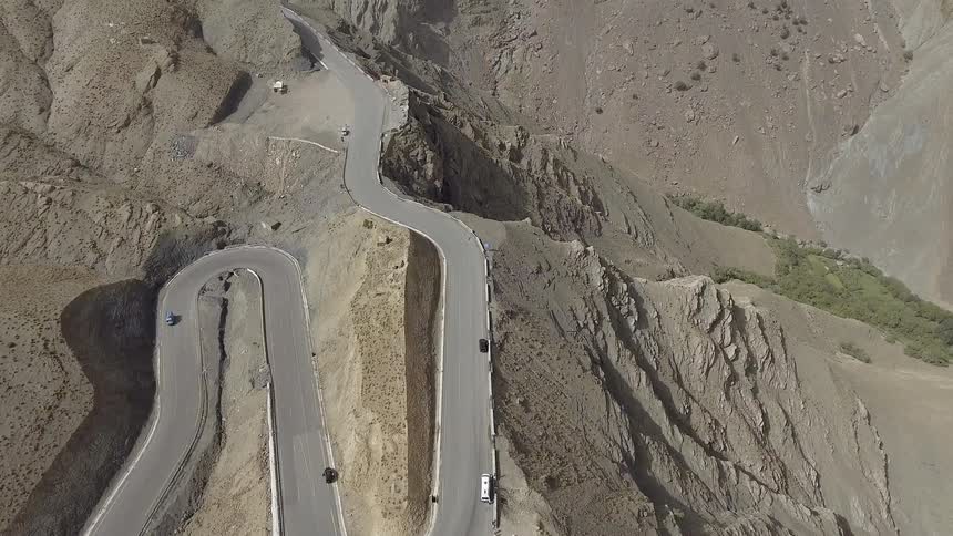 Cars driving on mountain road