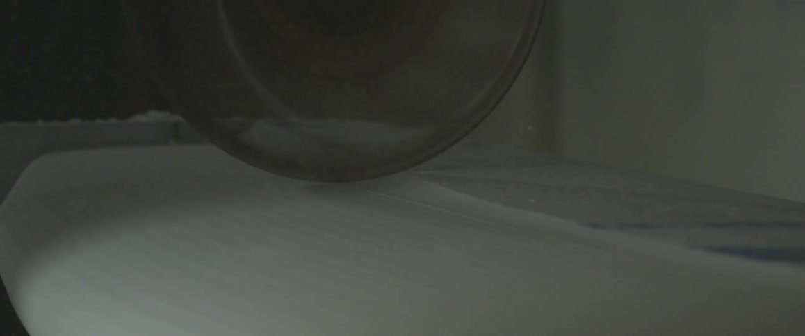A machine's wheel moves quickly