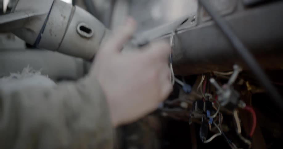 Someone is driving a truck that is missing part of the dashboard