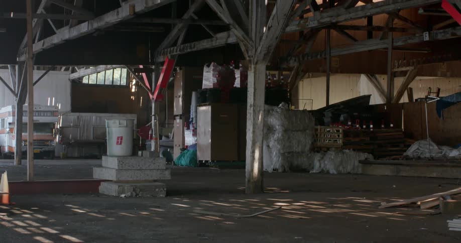 The warehouse is empty besides some tools