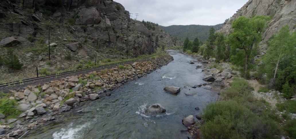 A river flows through mountains