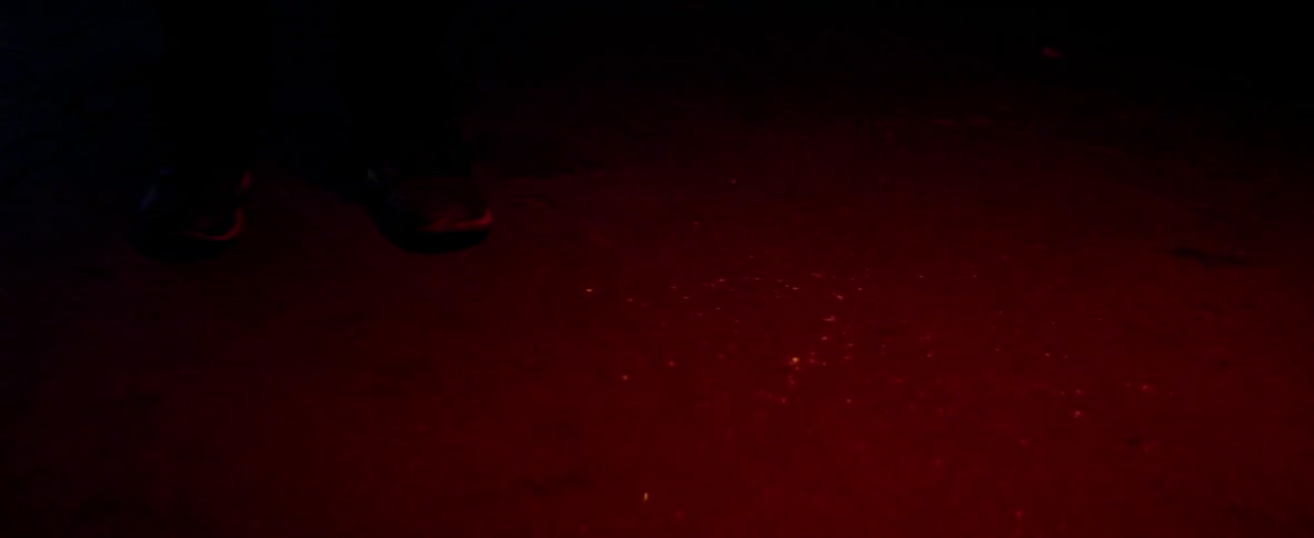 Sparks fall to the floor at night