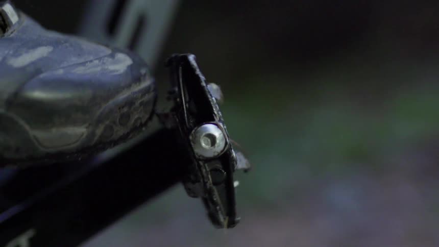 A rider kicks a foot pedal