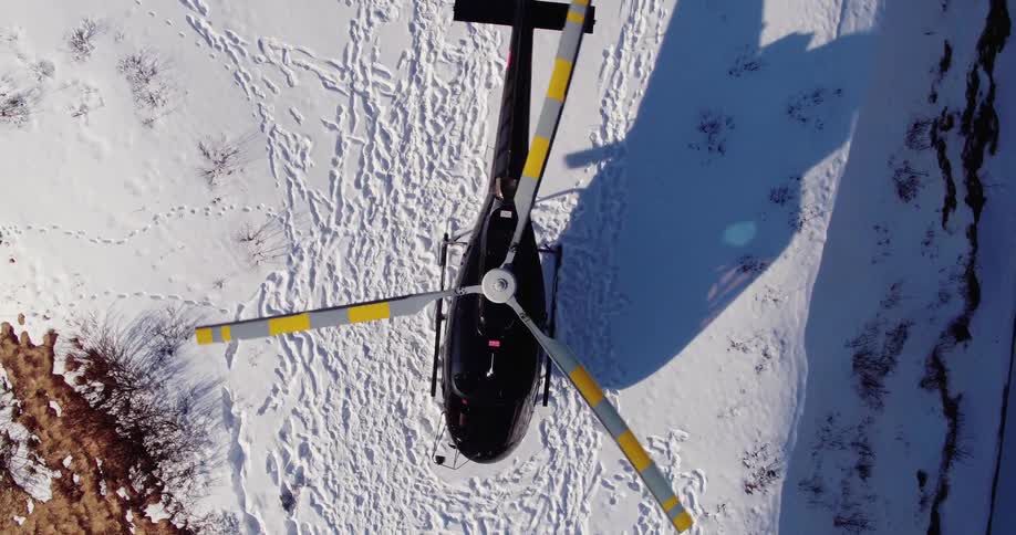 A helicopter prepares to take off