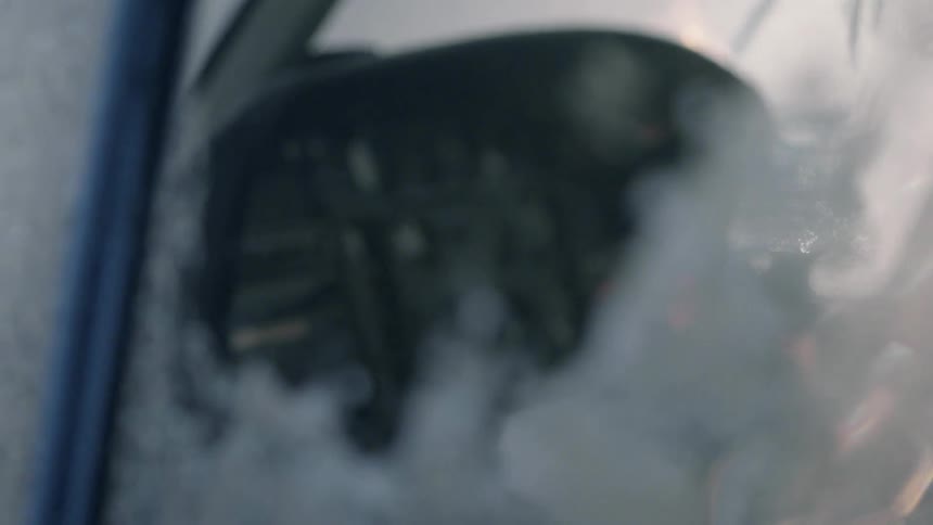 A frosted window of a helicopter